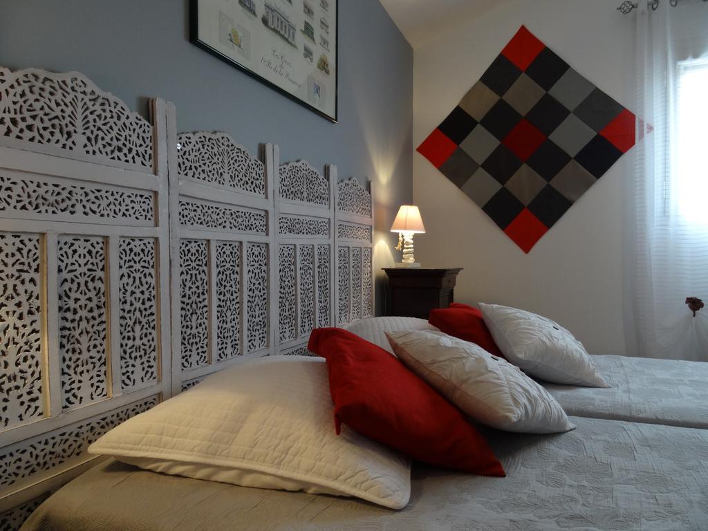 Une Chambre En Ville Savigneux  Pokoj fotografie